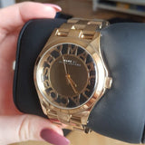 Marc Jacobs Henry Transparent Gold Dial Gold Steel Strap Watch for Women - MBM3206 Buy Now By Marc Jacobs