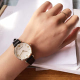 Emporio Armani Gianni T-Bar Quartz Mother of Pearl Dial Black Leather Strap Watch For Women - AR1910 Buy Now By Emporio Armani