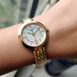 Tissot Flamingo Mother of Pearl White Dial Gold Steel Strap Watch For Women - T094.210.33.111.00 Buy Now By Tissot
