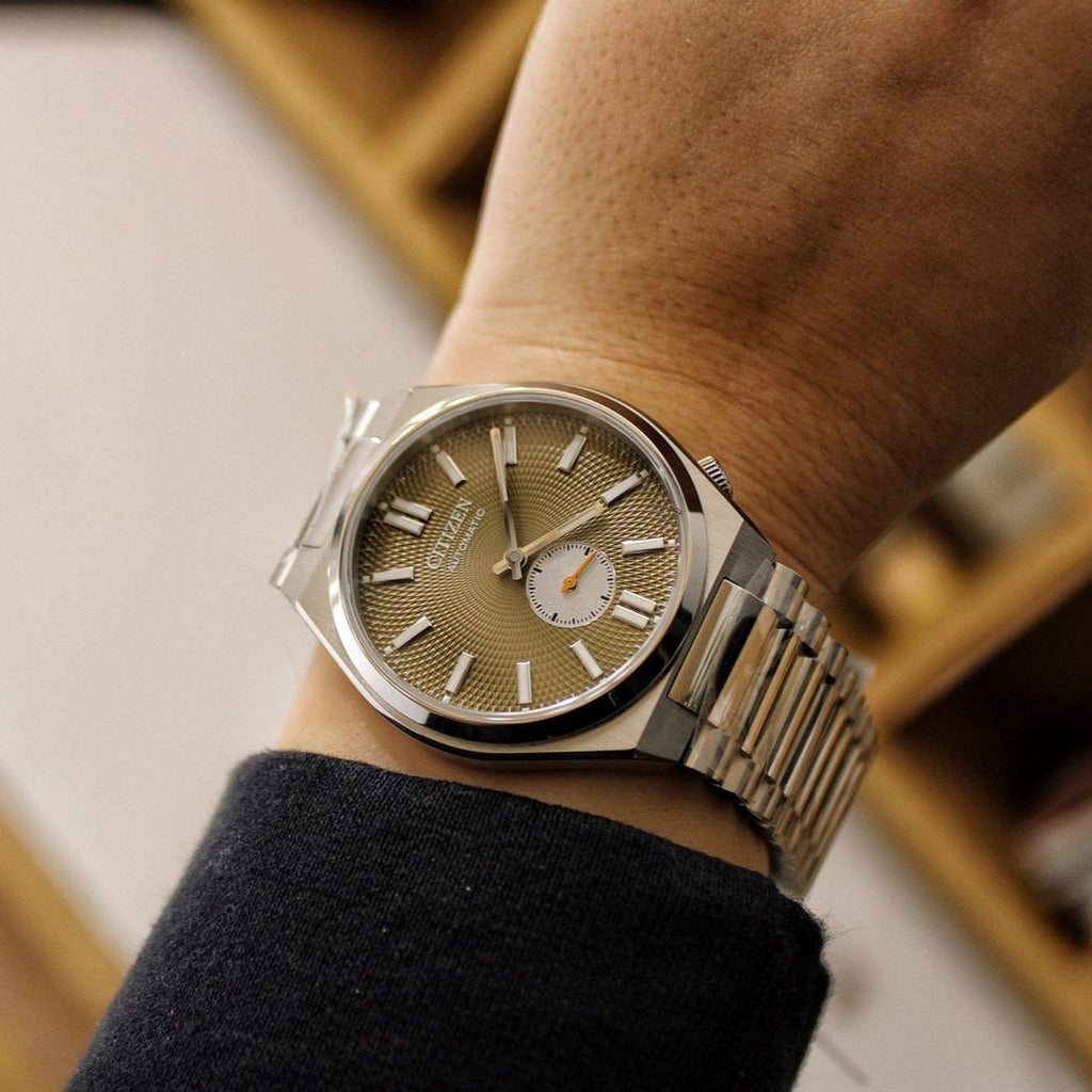 Citizen Tsuyosa Automatic Titanium Yellow Dial Silver Steel Strap Watch For Men - NK5010-51X Buy Now By Citizen