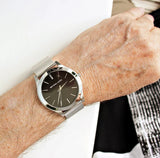 Michael Kors Slim Runway Analog Black Dial Silver Mesh Bracelet Watch For Men - MK8606 Buy Now By Michael Kors