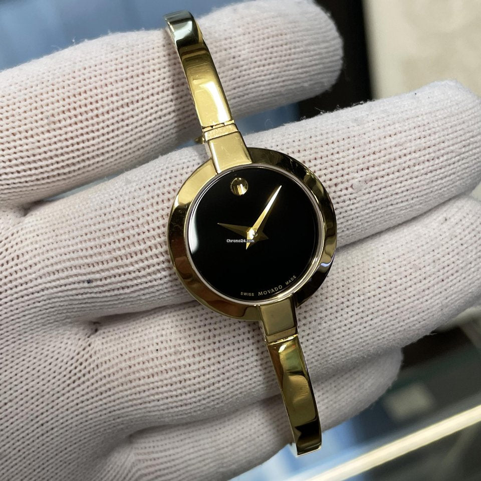 Movado Bela Black Dial Gold Steel Strap Watch For Women - 0606999 Buy Now By Movado