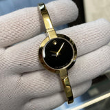 Movado Bela Black Dial Gold Steel Strap Watch For Women - 0606999 Buy Now By Movado