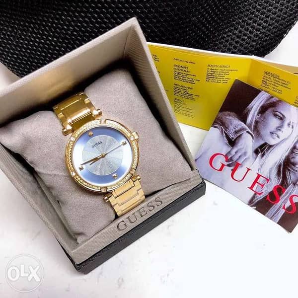Guess Park Avenue Blue Dial Gold Steel Strap Watch For Women - W0695L2 Buy Now By Guess