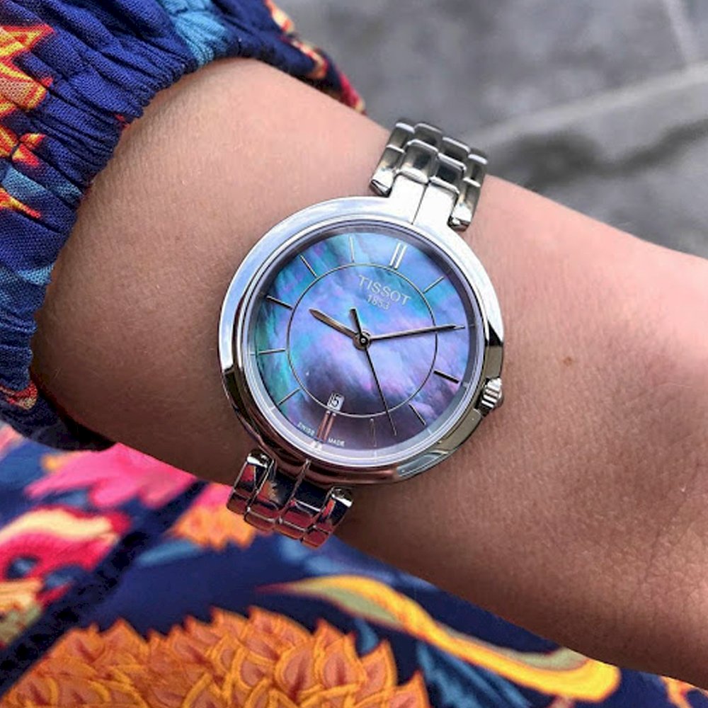 Tissot T Lady Flamingo Mother of Pearl Blue Dial Silver Steel Strap Watch For Women - T094.210.11.121.00 Buy Now By Tissot