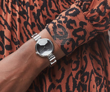 Calvin Klein Wavy Black Dial Silver Steel Strap Watch for Women - K9U23141 Buy Now By Calvin Klein