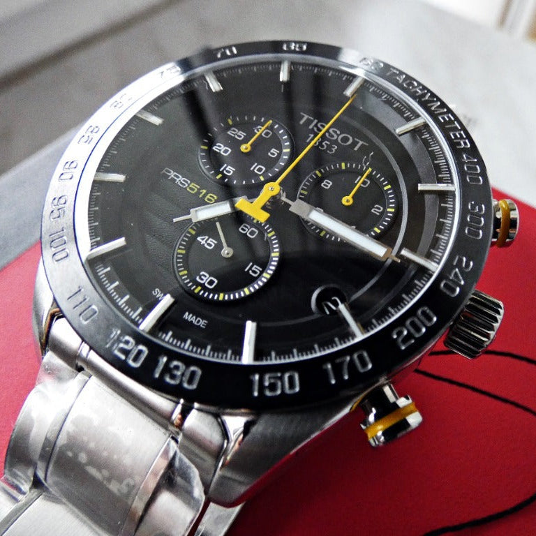 Tissot PRS 516 Chronograph Black Dial Silver Steel Strap Watch For Men - T100.417.11.051.00 Buy Now By Tissot