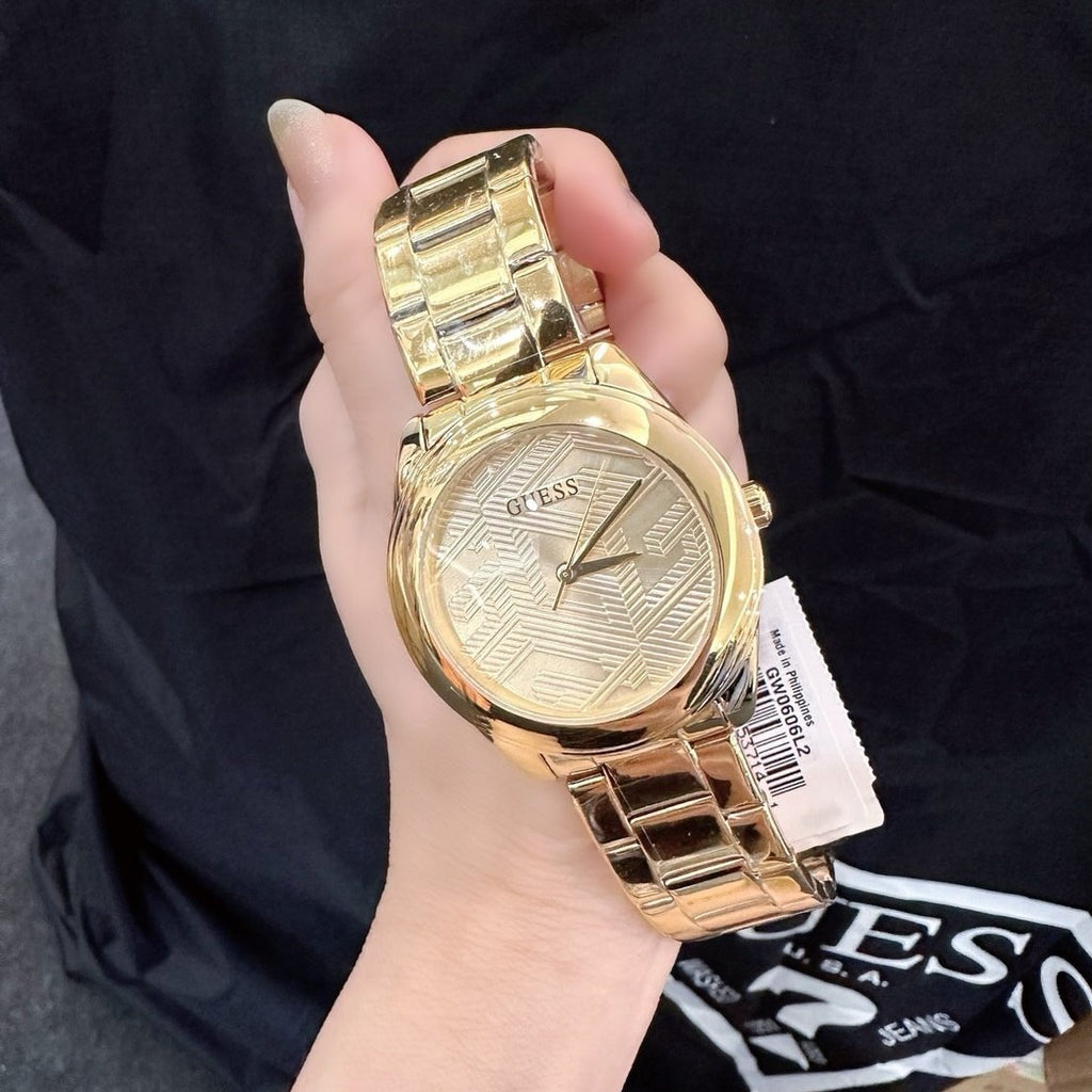 Guess Cubed Analog Gold Dial Gold Steel Strap Watch For Women - GW0606L2 Buy Now By Guess