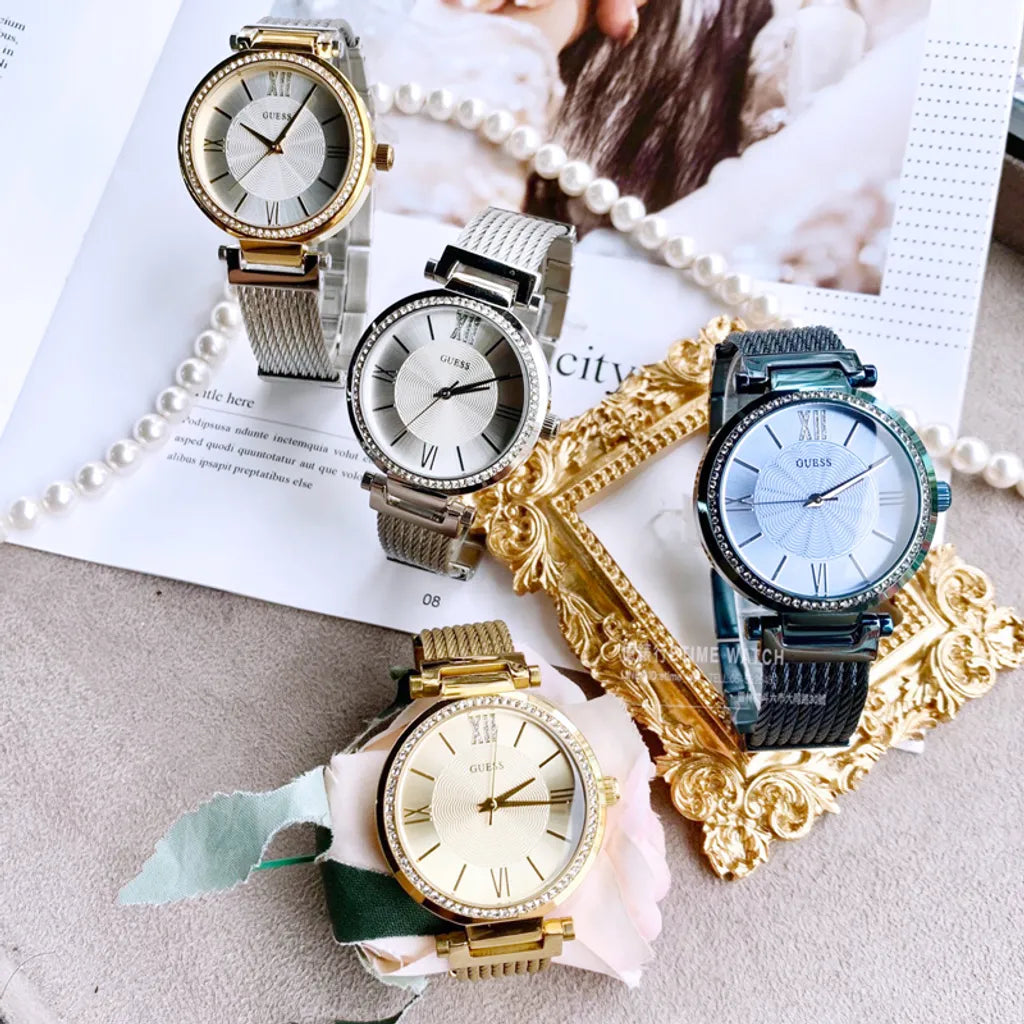 Guess Soho Diamonds Silver Dial Silver Mesh Bracelet Watch for Women - W0638L7 Buy Now By Guess