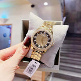 Guess Night Life Diamonds Black Dial Gold Steel Strap Watch for Women - GW0405L2 Buy Now By Guess