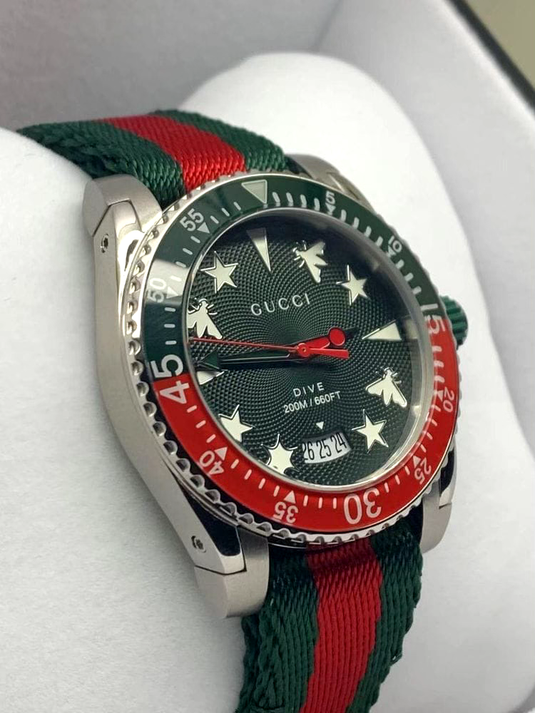 Gucci Dive Quartz Green Dial Two Tone NATO Strap Watch For Men - YA136339 Buy Now By Gucci