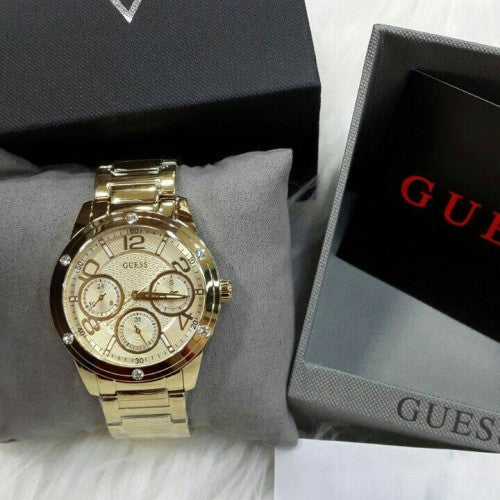 Guess Crystal Multifunction Gold Dial Gold Steel Strap Watch for Women - W0778L2 Buy Now By Guess