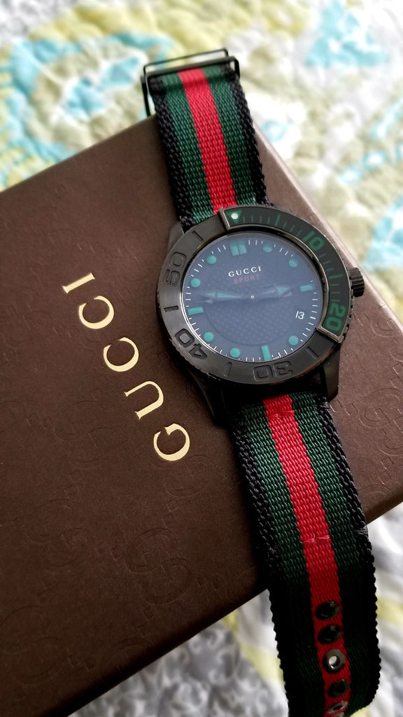 Gucci G Timeless Sport Black Dial Two Tone NATO Strap Watch For Men - YA126229 Buy Now By Gucci