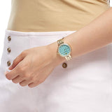 Swarovski Daytime Crystals Turquoise Dial Gold Steel Strap Watch for Women - 5182212 Buy Now By Swarovski