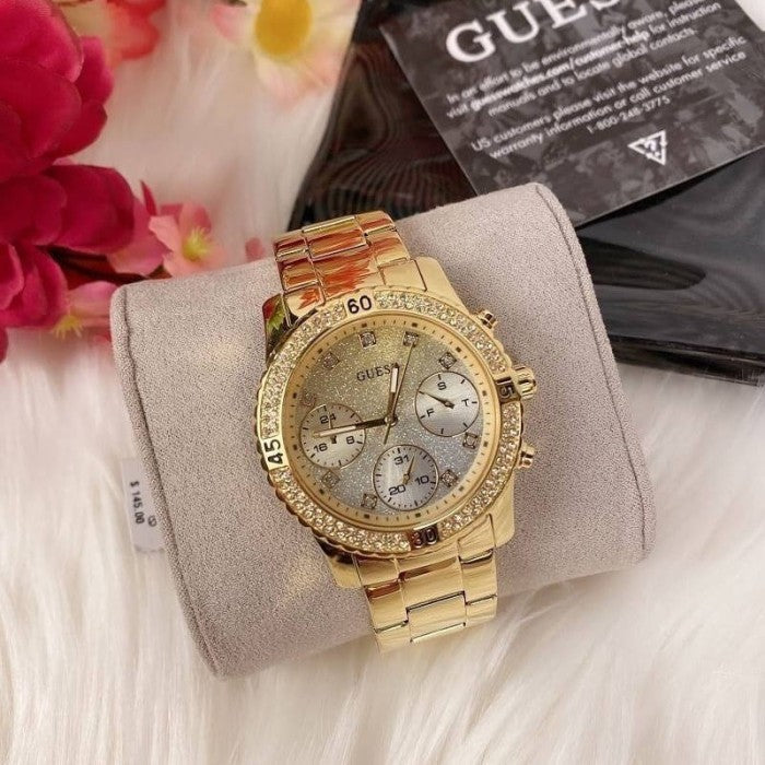 Guess Confetti Diamonds Silver Dial Gold Steel Strap Watch for Women - W0774L5 Buy Now By Guess