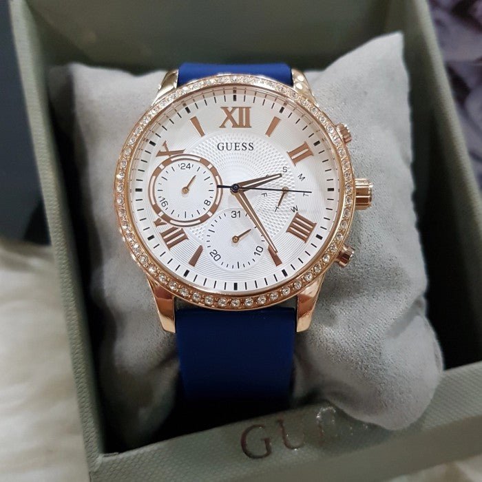 Guess Solar White Rose Gold Dial Blue Rubber Strap Watch For Women - W1135L3 Buy Now By Guess