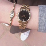 Movado Museum Classic Quartz Black Dial Gold Steel Strap Watch For Women - 0607005 Buy Now By Movado