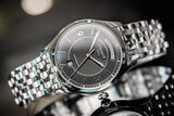 Tissot T Classic T One Automatic Black Dial Silver Steel Strap Watch For Men - T038.430.11.057.00 Buy Now By Tissot