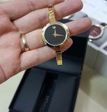 Movado Bela Black Dial Gold Steel Strap Watch For Women - 0606999 Buy Now By Movado