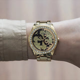 Guess G Twist Diamonds Gold Dial Gold Steel Strap Watch For Women - W1201L2 Buy Now By Guess