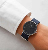 Daniel Wellington Classic Bayswater Black Dial Black NATO Strap Watch For Women - DW00100282 Buy Now By Daniel Wellington