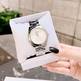 Guess Cubed Analog Silver Dial Silver Steel Strap Watch For Women - GW0606L1 Buy Now By Guess