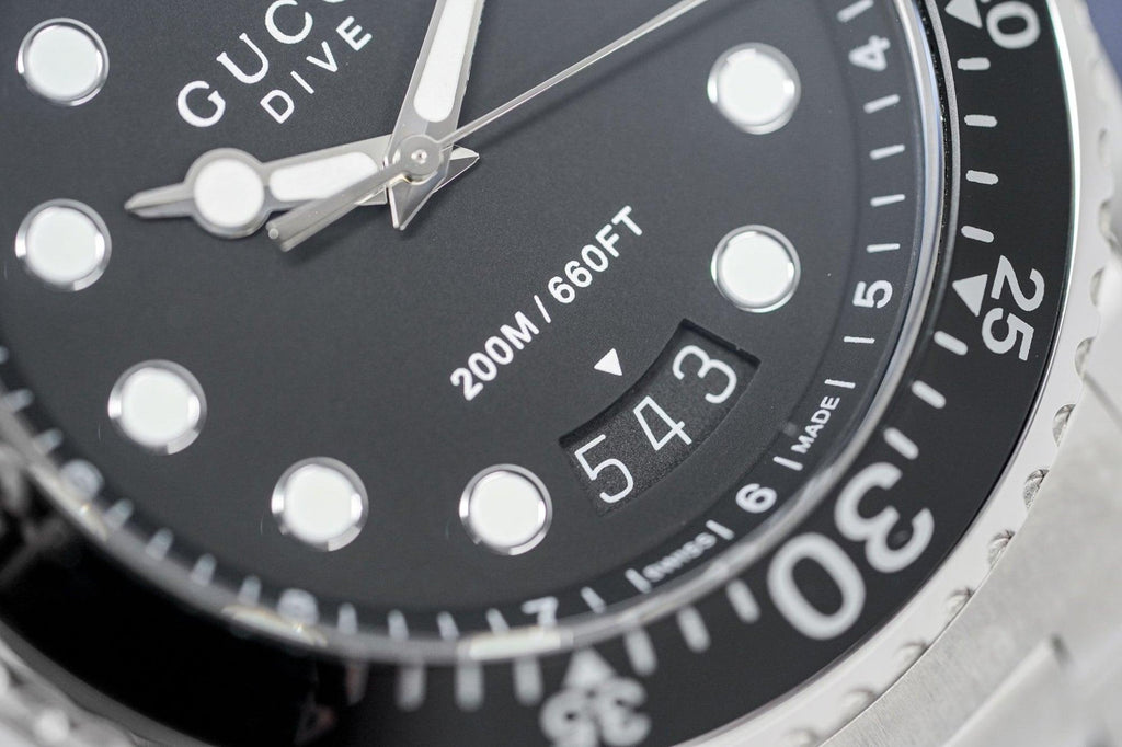 Gucci Dive Analog Black Dial Silver Steel Strap Watch For Men - YA136208 Buy Now By Gucci