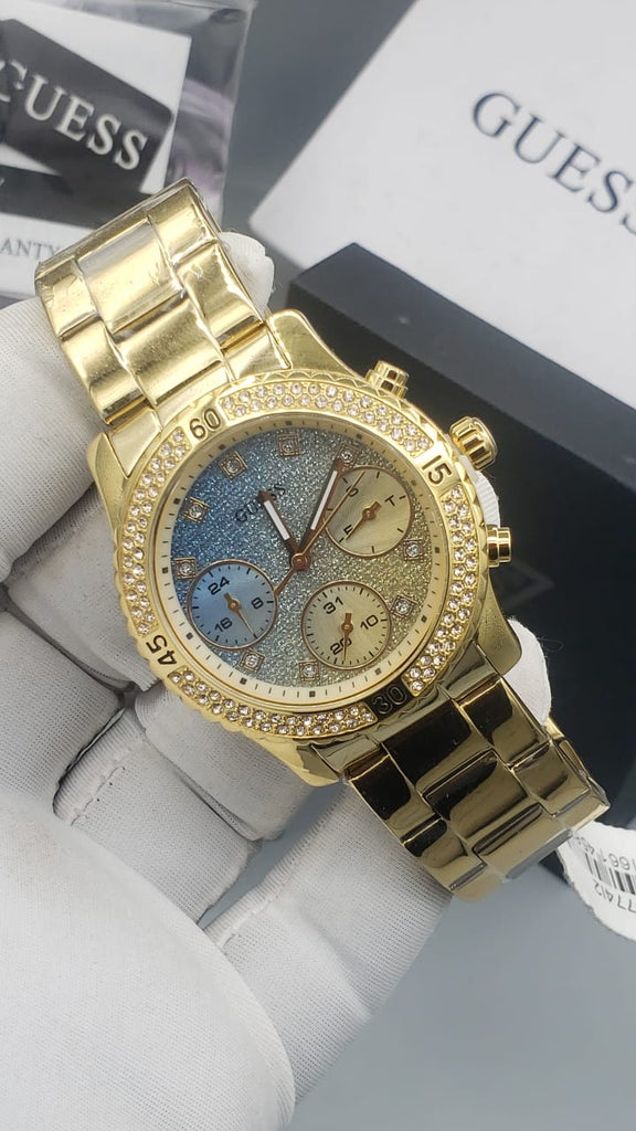 Guess Confetti Diamonds Gold Dial Gold Steel Strap Watch for Women - W0774L2 Buy Now By Guess