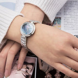 Tissot T Lady Flamingo Mother of Pearl Blue Dial Silver Steel Strap Watch For Women - T094.210.11.121.00 Buy Now By Tissot