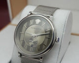 Versace V-Circle Silver Dial Silver Mesh Bracelet Watch for Men - VBQ060017 Buy Now By Versace