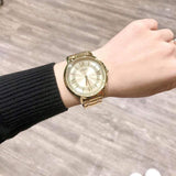 Guess Montauk Gold Dial Gold Steel Strap Watch for Women - W0933L2 Buy Now By Guess