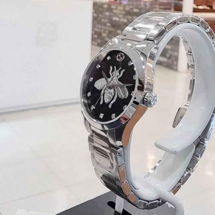 Gucci G Timeless Quartz Diamonds Black Dial Silver Steel Strap Watch For Women - YA1265024 Buy Now By Gucci