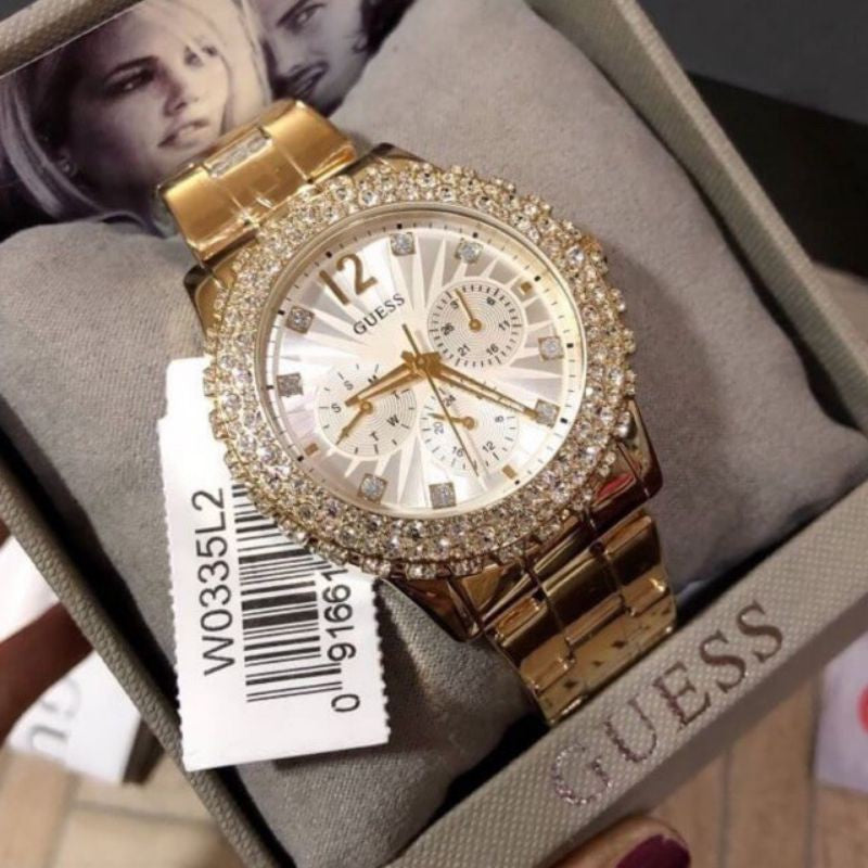 Guess Dazzler Diamonds Silver Dial Gold Steel Strap Watch for Women - W0335L2 Buy Now By Guess