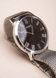 Guess Analog Black Dial Silver Mesh Bracelet Watch for Men - W1263G1 Buy Now By Guess