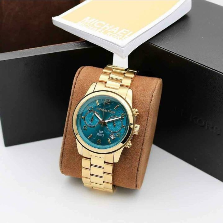 Michael Kors Runway Hunger Stop100 Series Blue Dial Gold Steel Strap Watch for Women - MK5815 Buy Now By Michael Kors