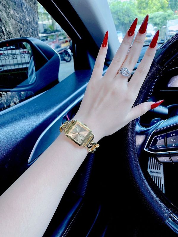 Guess Vanity Gold Dial Gold Steel Strap Watch for Women - W1029L2 Buy Now By Guess