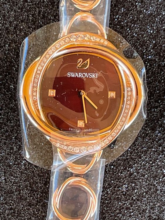 Swarovski Crystal Flower Red Dial Rose Gold Steel Strap Watch for Women - 5552783 Buy Now By Swarovski