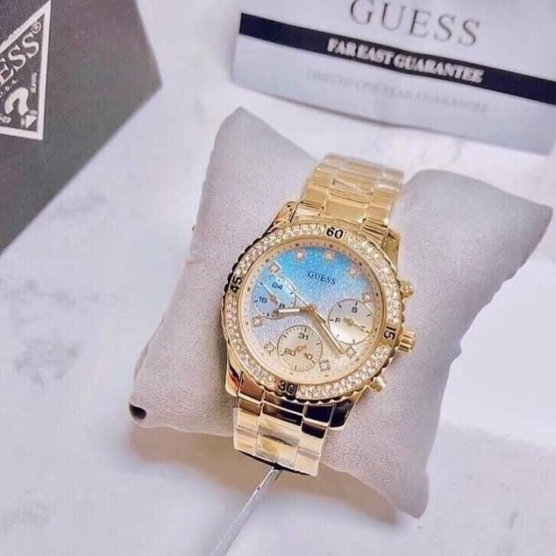 Guess Confetti Diamonds Gold Dial Gold Steel Strap Watch for Women - W0774L2 Buy Now By Guess