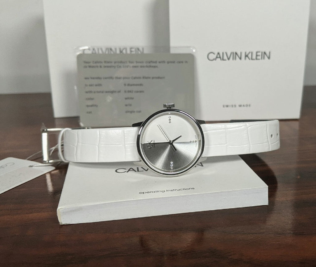 Calvin Klein Accent Silver Dial White Leather Strap Watch for Women - K2Y2Y1KW Buy Now By Calvin Klein