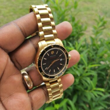 Movado Series 800 Black Dial Gold Steel Strap Watch For Men - 2600145 Buy Now By Movado