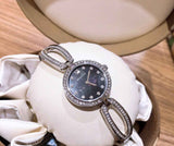 Bulova Crystal Black Mother of Pearl Dial Silver Steel Strap Watch for Women - 96L224 Buy Now By Bulova