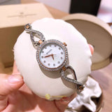 Bulova Crystals Mother of Pearl Dial Two Tone Steel Strap Watch for Women - 98X108 Buy Now By Bulova