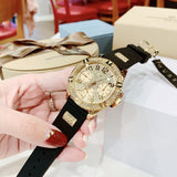 Guess Frontier Diamonds Gold Dial Black Rubber Strap Watch For Women - W1160L1 Buy Now By Guess