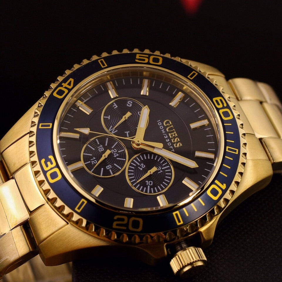 Guess Chaser Multifunction Blue Dial Gold Steel Strap Watch for Men - W0172G5 Buy Now By Guess