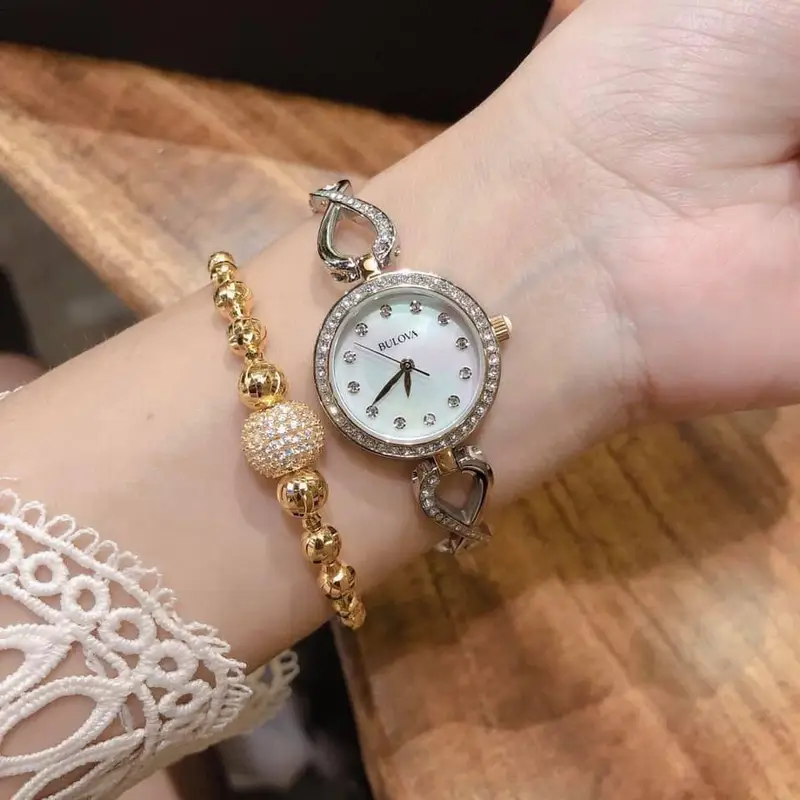 Bulova Analog Crystals Mother of Pearl Dial Silver Steel Strap Watch for Women - 98X109 Buy Now By Bulova