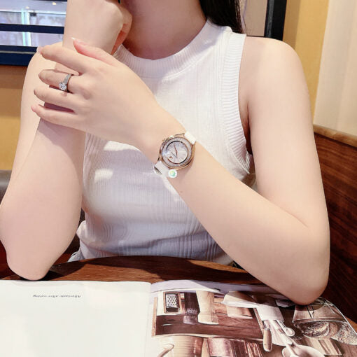 Swarovski Crystalline Aura Silver Dial White Leather Strap Watch for Women - 5519453 Buy Now By Swarovski