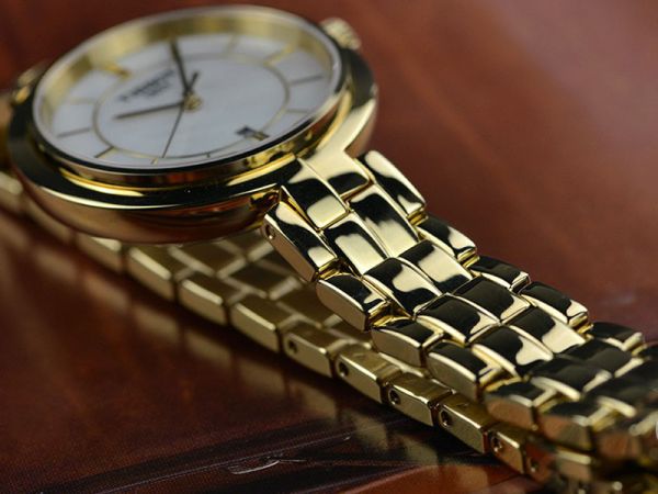 Tissot Flamingo Mother of Pearl White Dial Gold Steel Strap Watch For Women - T094.210.33.111.00 Buy Now By Tissot