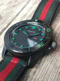 Gucci G Timeless Sport Black Dial Two Tone NATO Strap Watch For Men - YA126229 Buy Now By Gucci