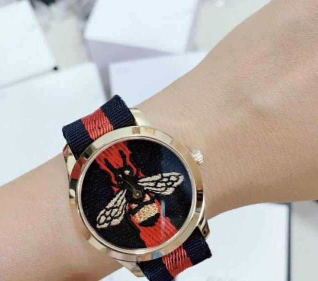 Gucci G Timeless Bee Red & Blue Dial Red Two Tone Nylon Strap Watch For Men - YA1264061 Buy Now By Gucci