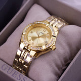 Guess Dazzling Diamonds Gold Dial Gold Steel Strap Watch for Women - W85110L1 Buy Now By Guess
